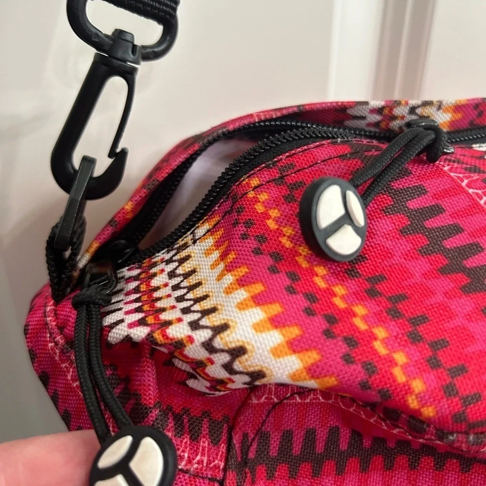 Like new YakPak duffle bag. Pink colorful zigzag design with black details